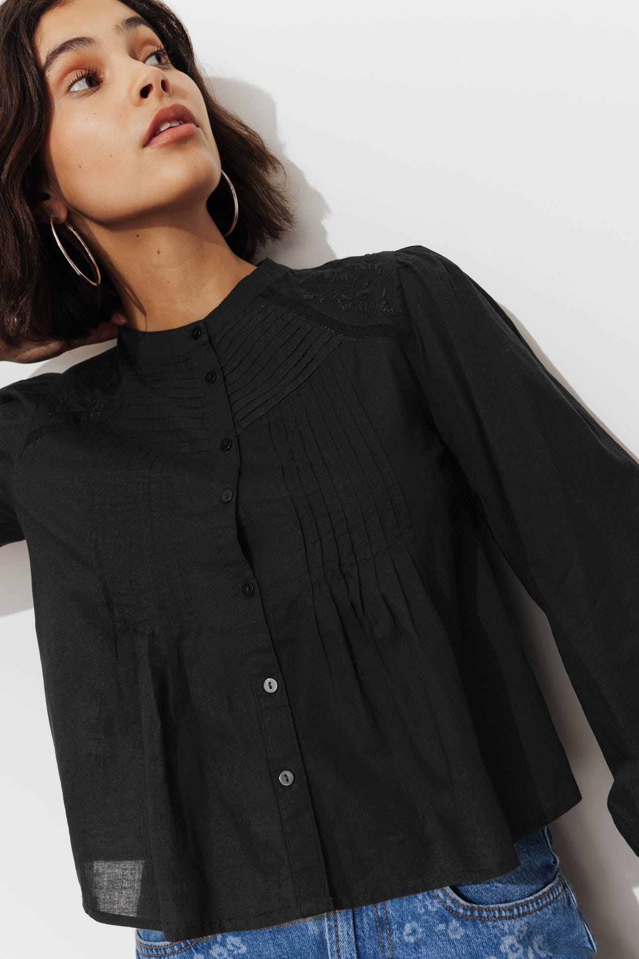 Blusa romántica plisada