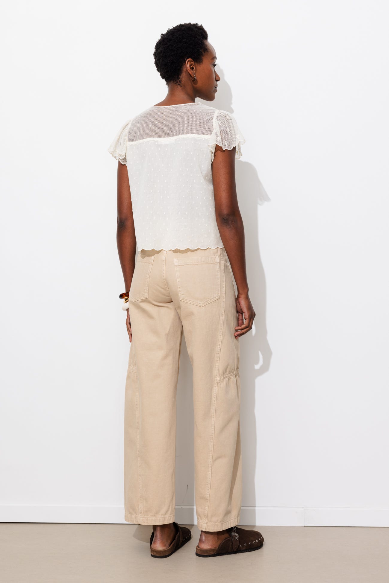 Pantalon large à oeillets