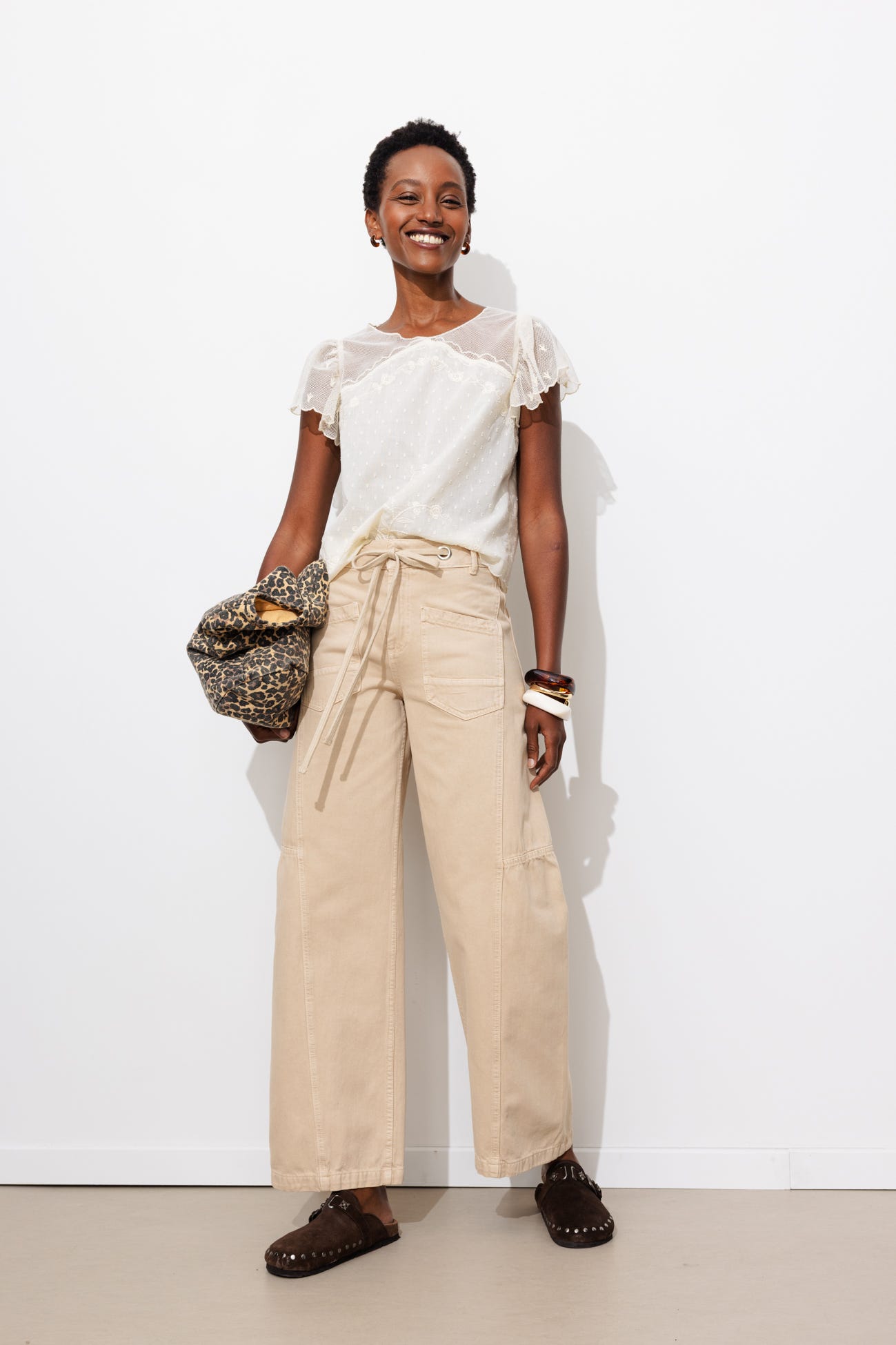 Pantalon large à oeillets