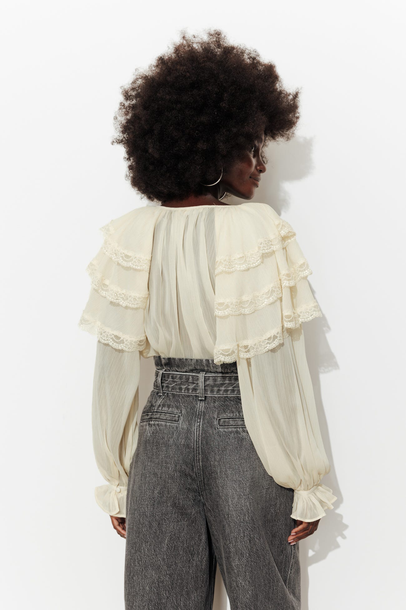 Blusa maniche lunghe volant