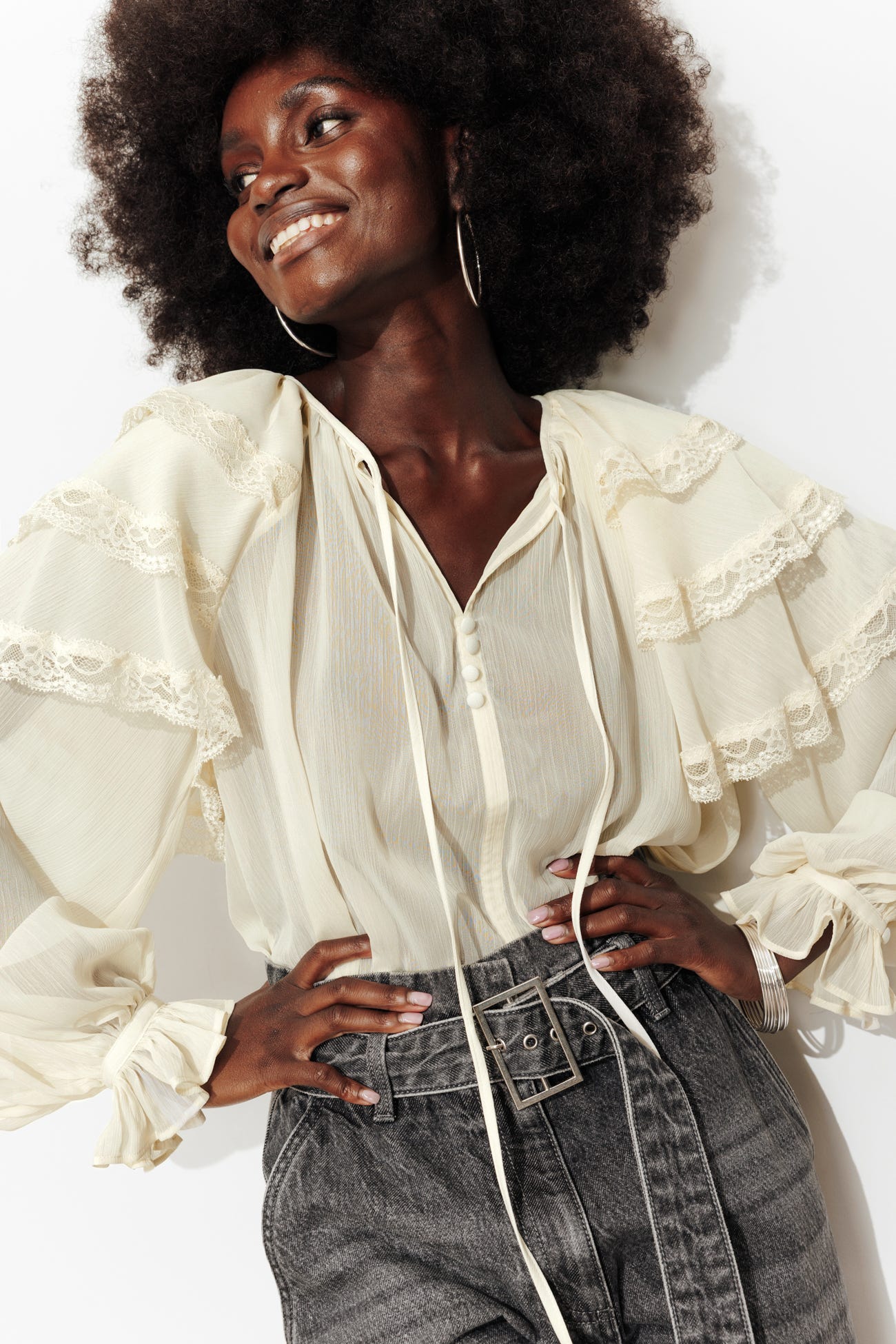 Blusa maniche lunghe volant