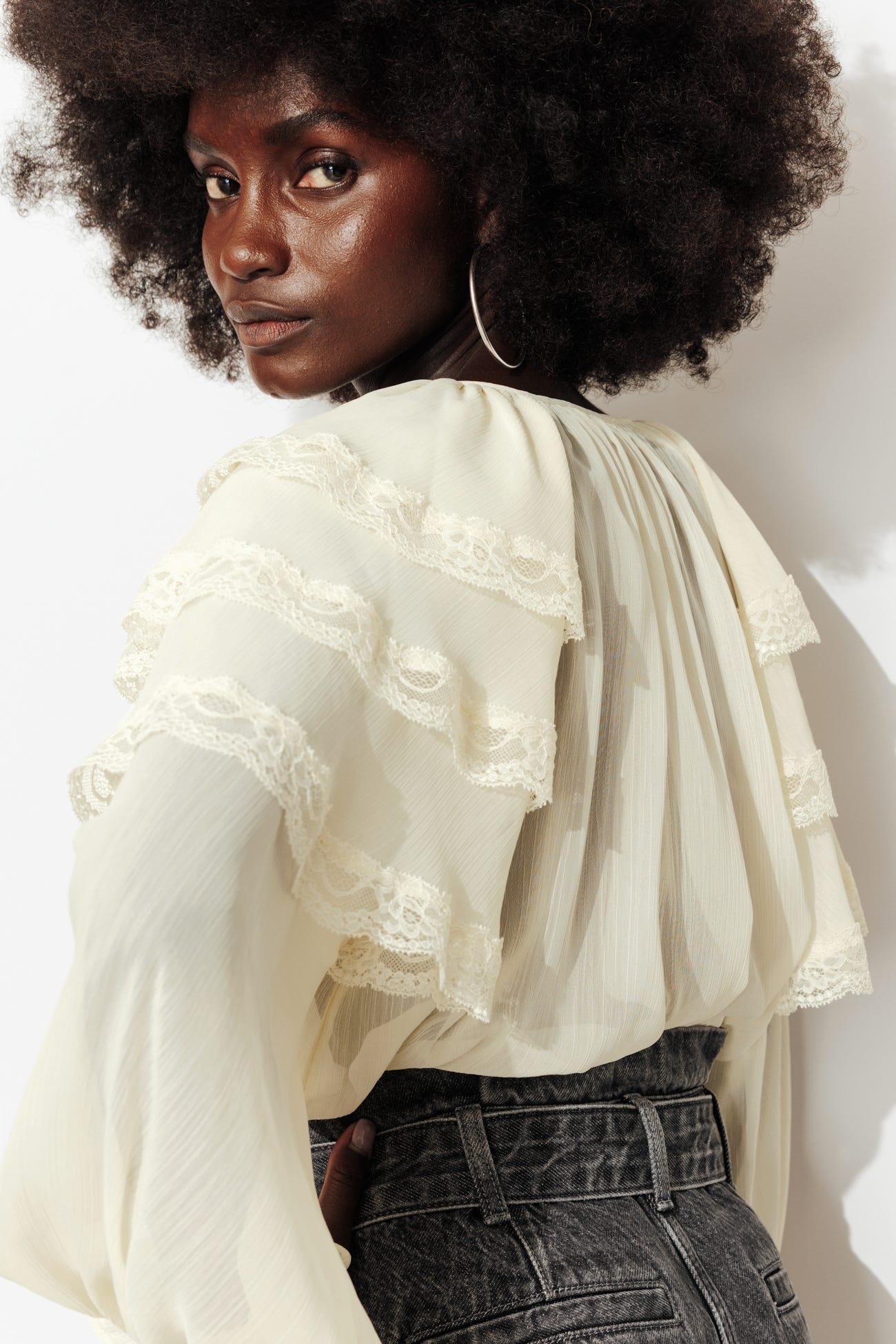 Blusa maniche lunghe volant