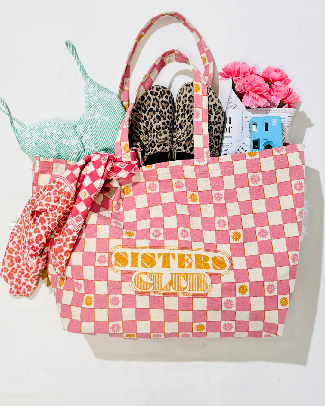 sac sister damier rose contenant produit été